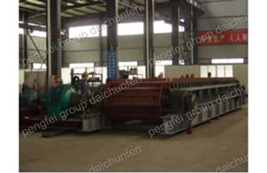 Transporteur a tablier metallique